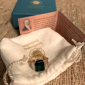 Gold-tone QVC Smithsonian Institute emerald ring
